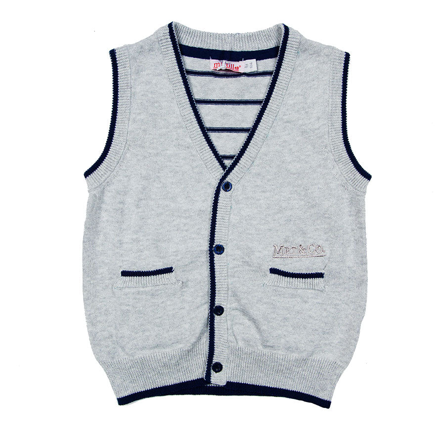 
  Gilet dellla linea abbigliamento bambino Mirtillo con scollo a v aperto sul davanti
  con abbo...