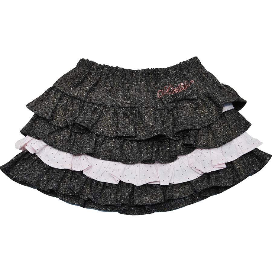 
  Gonna in tweed dellla linea abbigliamento bambina Mirtillo, con balze, applicazione di fiocche...