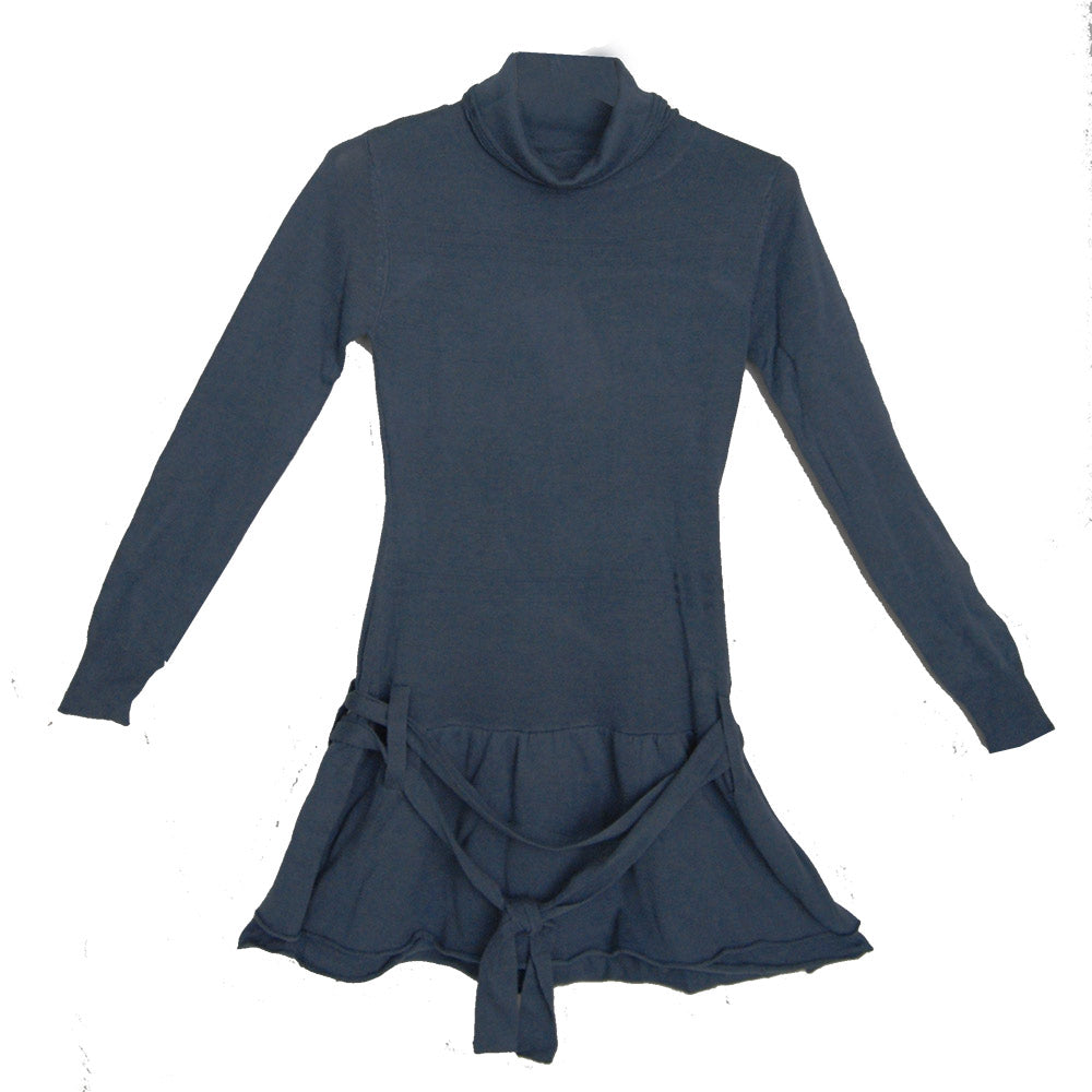 
  Abito in tricot della linea abbigliamento bambina Mirtillo. Tinta unita con collo
  alto. Tagl...