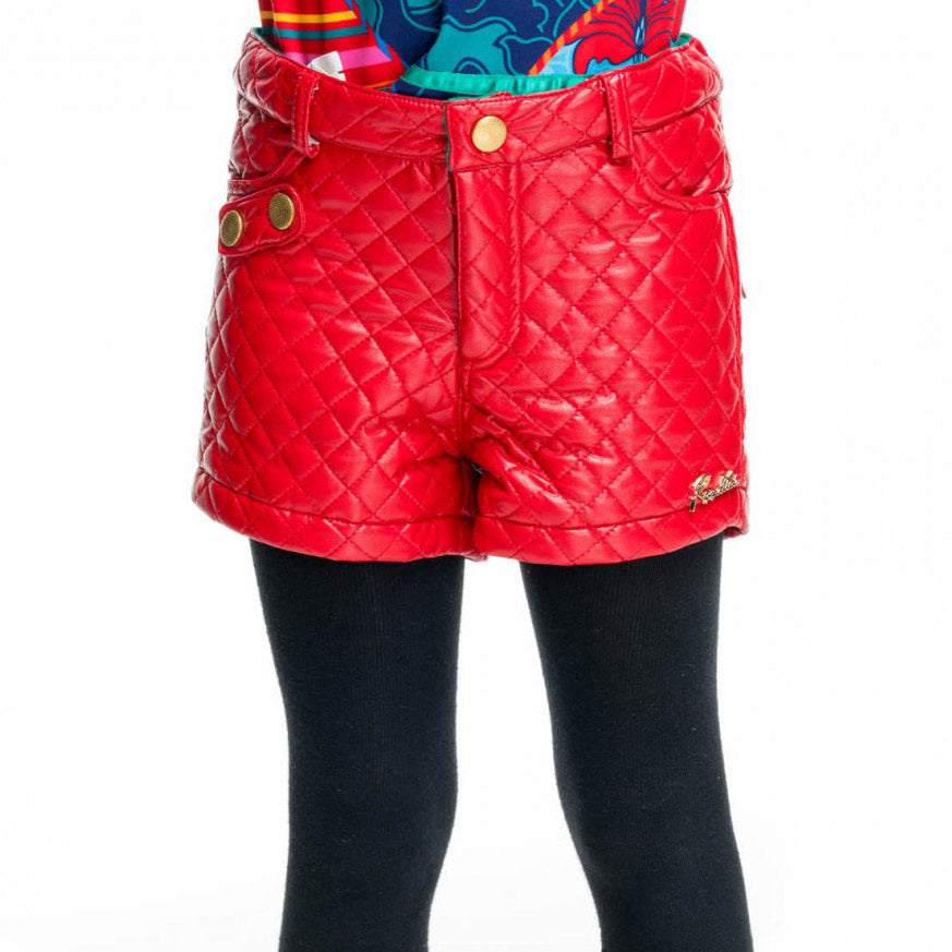 
  Shorts della linea abbigliamento bambina Rosalita Senoritas in similpelle trapuntato,
  con ta...