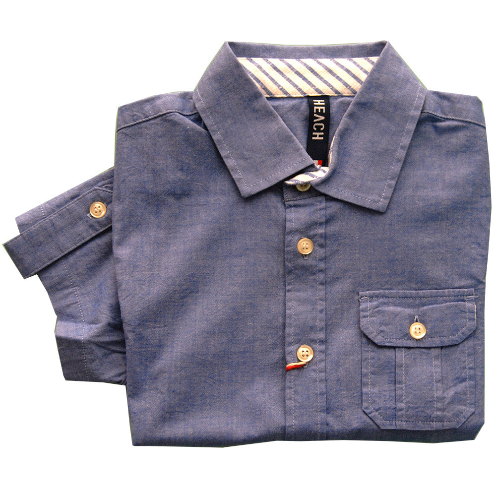 
  Camicia della linea abbigliamento bambino Silvian Heach. Tinta unita con taschina
  sul davant...