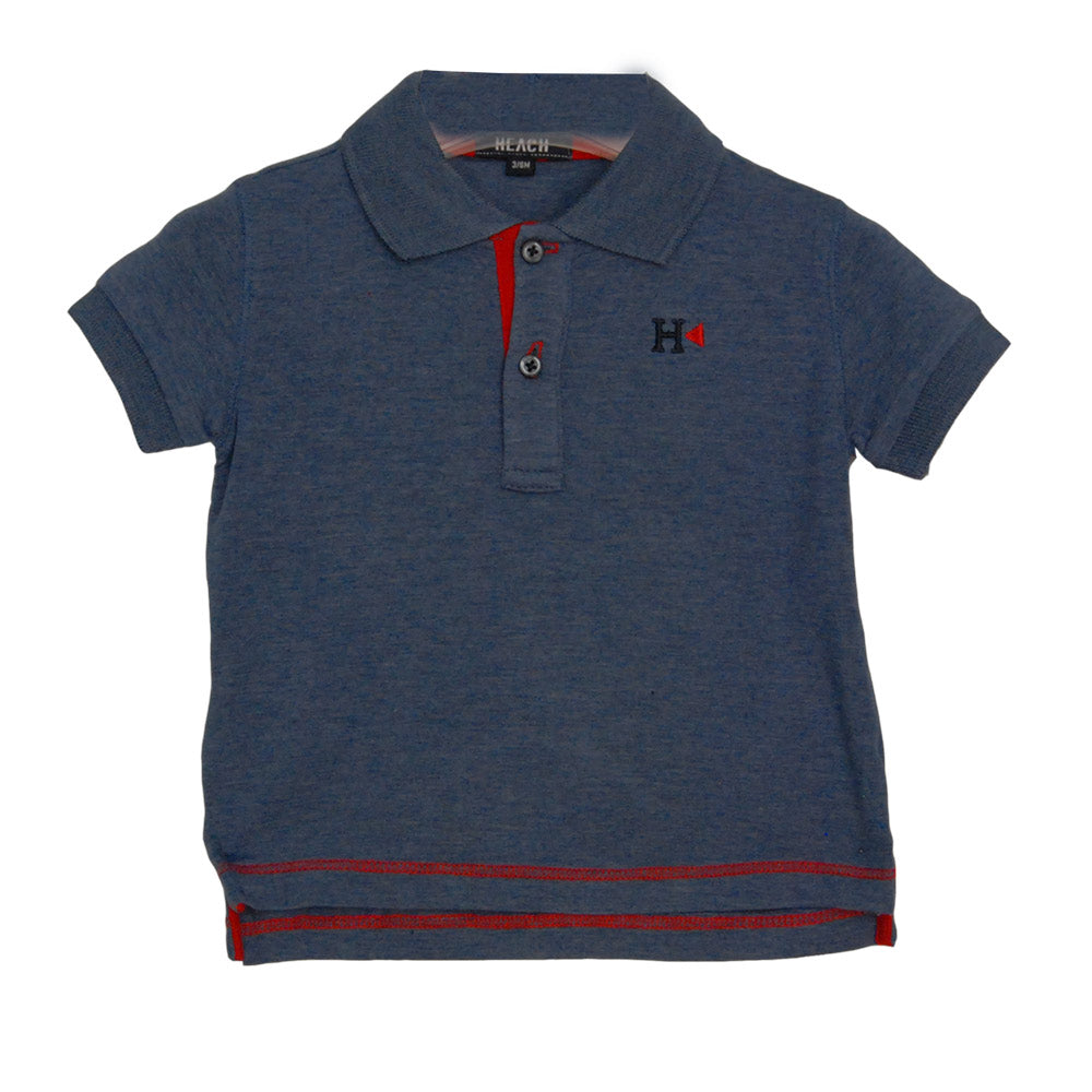 
  Polo della linea abbigliamento bambino Silvian Heach a rinta unita. Rifiniture in
  contrasto....