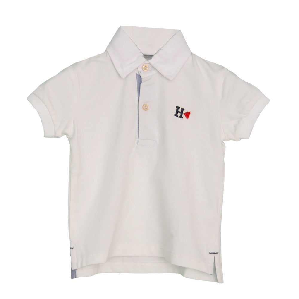 
  Polo della linea abbigliamento bambino Silvian Heach a tinta unita con ricamo colorato
  sul d...