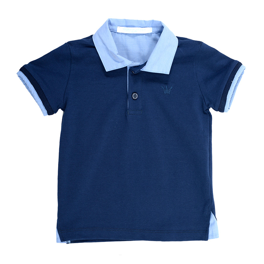 
  Polo manica corta della linea abbigliamento bambino Silvian Heach con finiture tipo
  camicia....