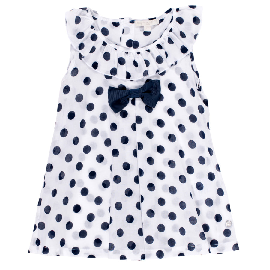 
  Blusa della linea abbigliamento bambina Silvian Heach Kids; fantasia a pois blu
  su sfondo bi...