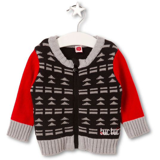 
  Cardigan della linea abbigliamento bambino Tuc Tuc. Sul davanti fantasia geometrica.
  Maniche...