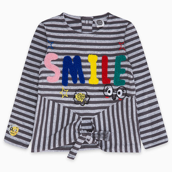 
  T-shirt della Linea Abbigliamento Bambina Tuc Tuc con bottoncini a pressione sul
  dietro, fan...