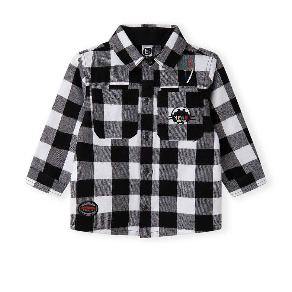 
Camicia della Linea Abbigliamento Bambino Tuc Tuc, in flanella con fantasia a quadri. 

Composiz...